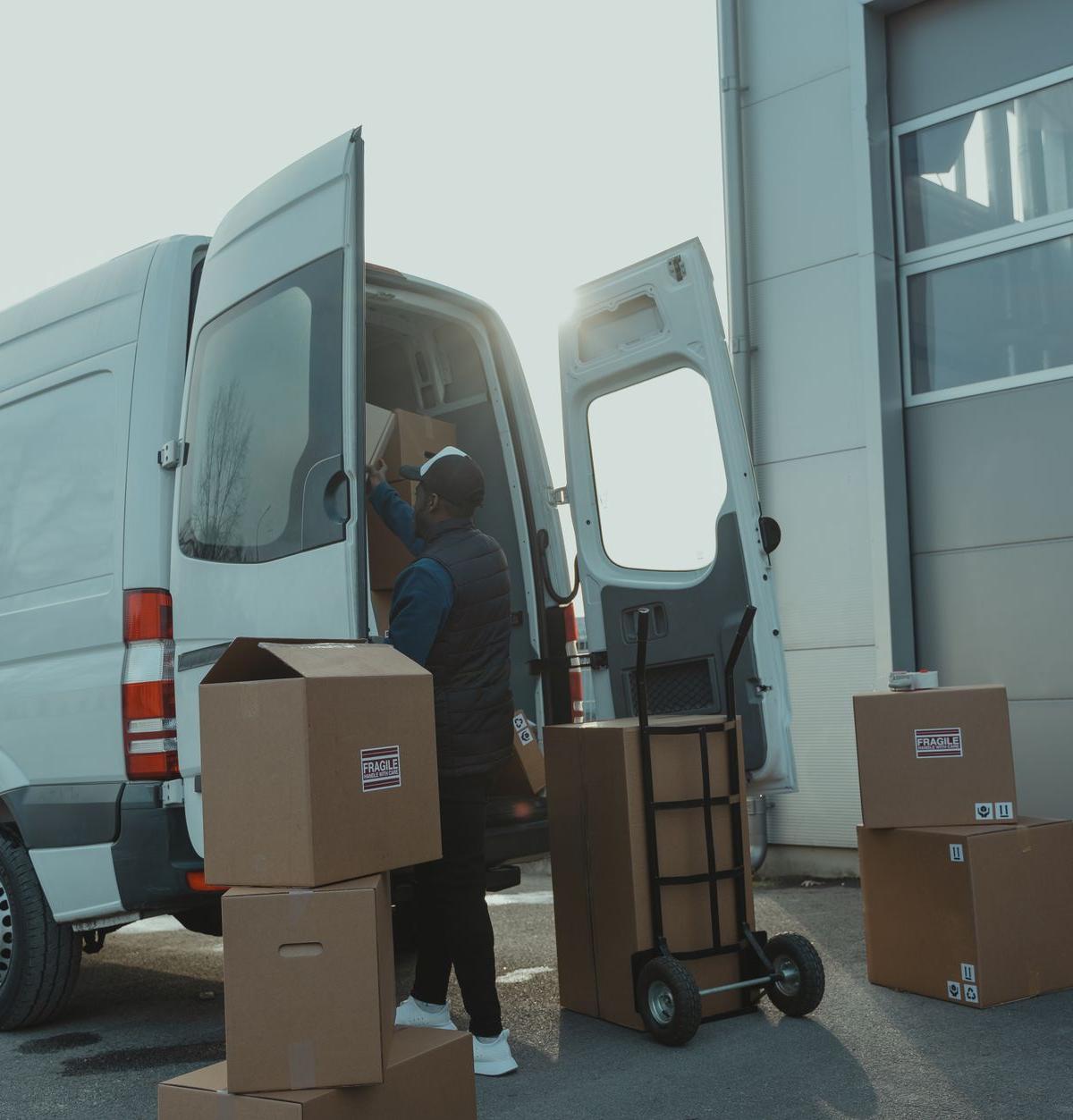 Self-employed driver delivering appliances